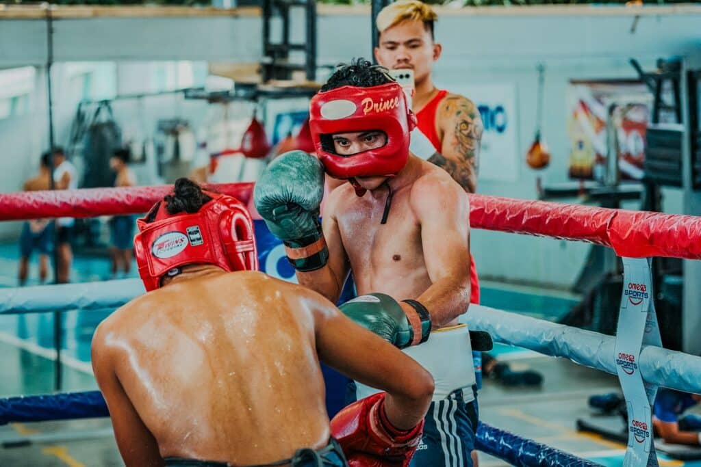 Melvin Jerusalem during his sparring with Omega Boxing Gym's Ramil Roda. Watching closely is world title challenger Christian Araneta. | Photo from Omega Boxing Gym