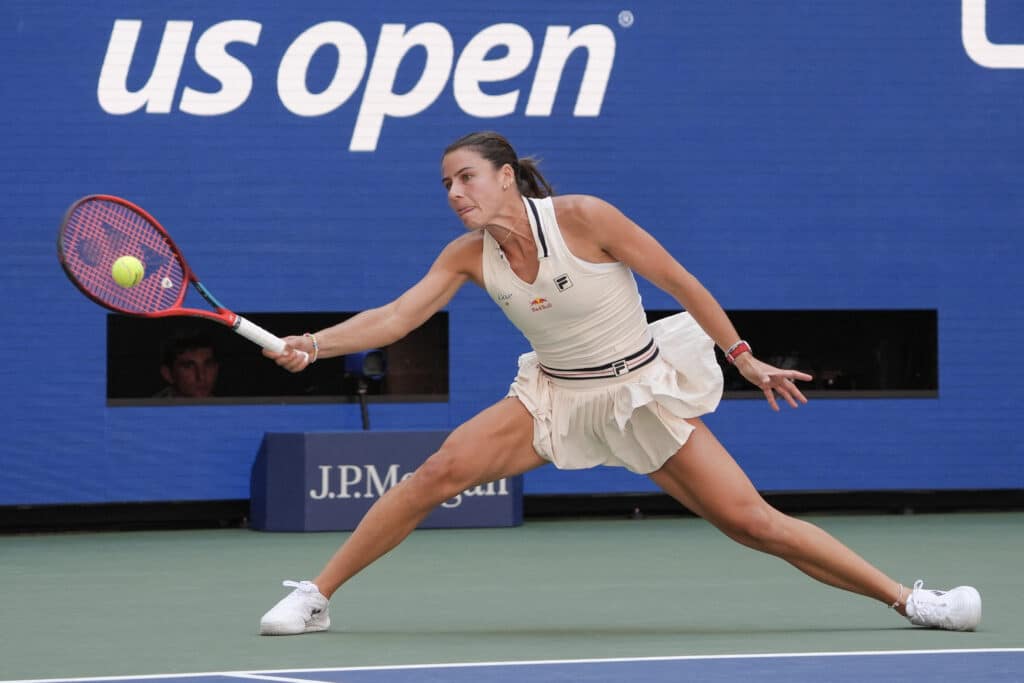 USA's Emma Navarro hits a return to Spain's Paula Badosa during their women's quarterfinals match on day nine of the US Open tennis tournament at the USTA Billie Jean King National Tennis Center in New York City, on September 3, 2024. (Photo by TIMOTHY A. CLARY / AFP)