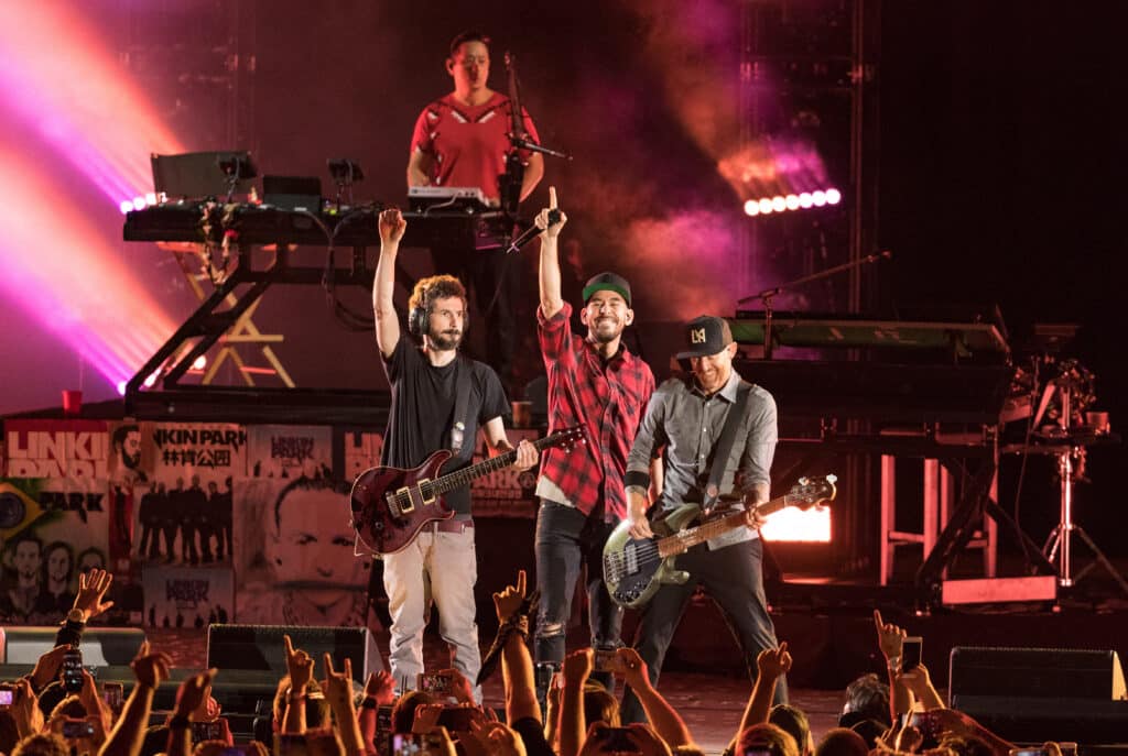 Linkin Park reunites 7 years after Chester Bennington's death. [FILES] In photo are musicians from Linkin Park; Brad Delsen, Mike Shinoda, Joe Hahn and Dave Farrell perform during the "Linkin Park And Friends Celebrate Life In Honor Of Chester Bennington" event at the Hollywood Bowl on October 27, 2017 in Hollywood, California.  | Christopher Polk/Getty Images/AFP