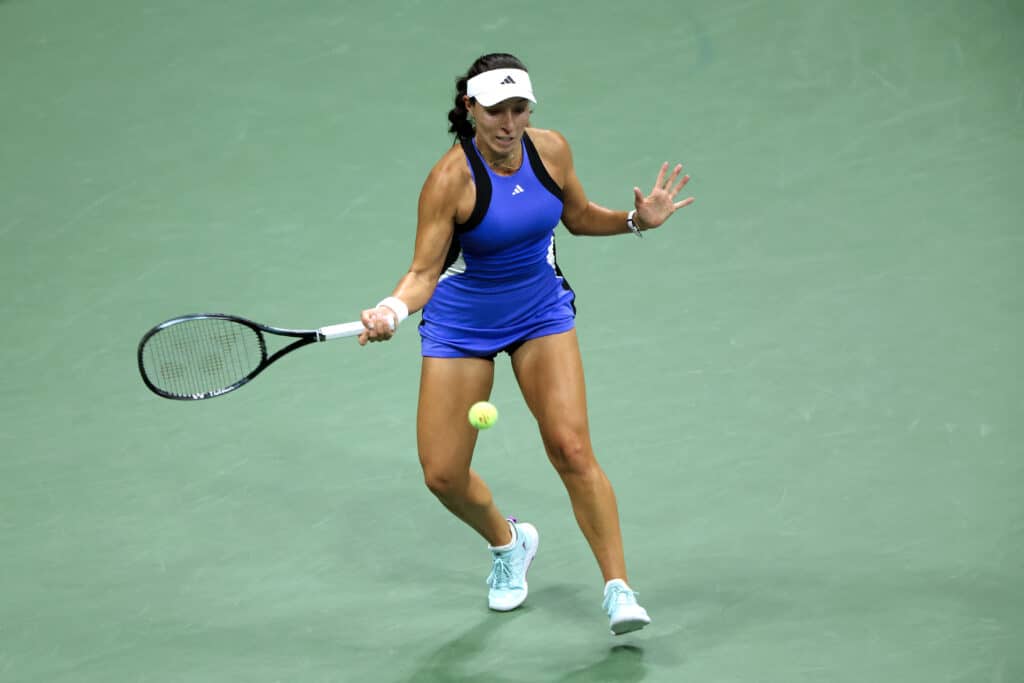 USA's Jessica Pegula plays a forehand return against Poland's Iga Swiatek during their women's quarterfinals match on day ten of the US Open tennis tournament at the USTA Billie Jean King National Tennis Center in New York City, on September 4, 2024. (Photo by CHARLY TRIBALLEAU / AFP)