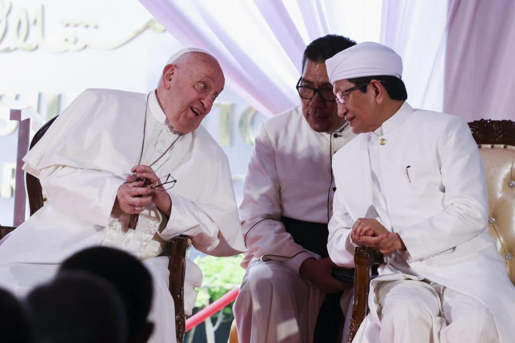 Pope Francis (L) and the Grand Imam of Istiqlal Mosque Nasaruddin Umar attend an inter-religious meeting at the Istiqlal Mosque in Jakarta on September 5, 2024. (Photo by Ajeng Dinar Ulfiana / POOL / AFP)