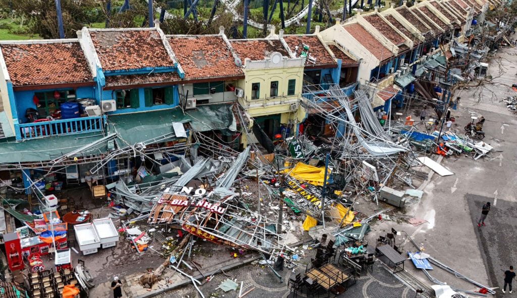 https://globalnation.inquirer.net/248269/super-typhoon-yagi-hits-vietnam-after-killing-two-in-china. Photo is an this aerial picture showing damaged buildings and debris on a street after Super Typhoon Yagi hit Ha Long, in Quang Ninh province, on September 8, 2024.| Photo by NHAC NGUYEN / AFP