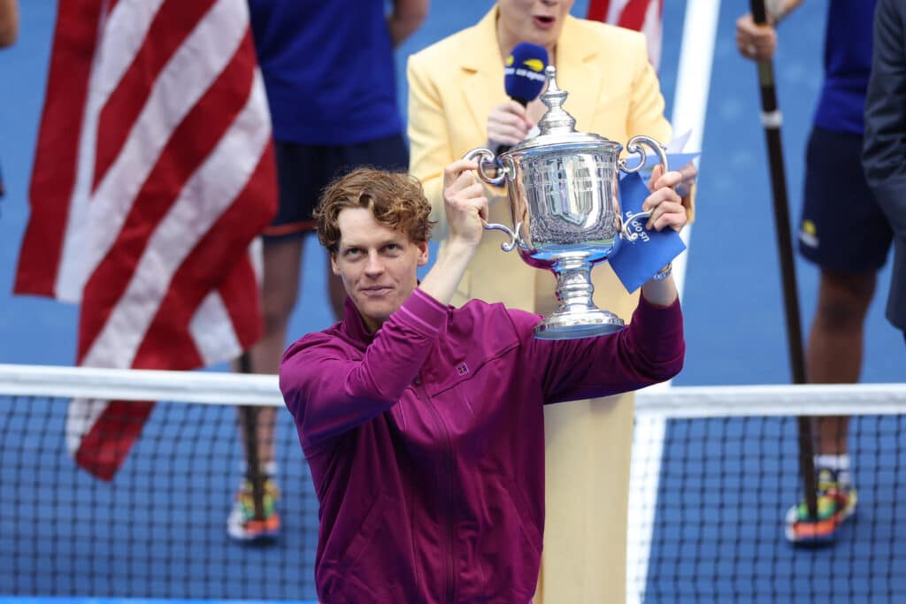 US Open final: Sinner beats Fritz, bags 2nd 2024 Grand Slam title. In photo is Italy's Jannik Sinner holding the trophy after winning his men's final match against USA's Taylor Fritz on day fourteen of the US Open tennis tournament at the USTA Billie Jean King National Tennis Center in New York City, on September 8, 2024. | Photo by CHARLY TRIBALLEAU / AFP