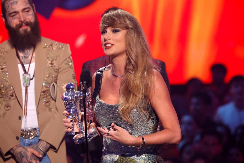 Taylor Swift accepts the Video of the Year award (Presented by Burger King) for "Fortnight" on stage during the 2024 MTV Video Music Awards at UBS Arena on September 11, 2024 in Elmont, New York.  | Mike Coppola/Getty Images for MTV/AFP