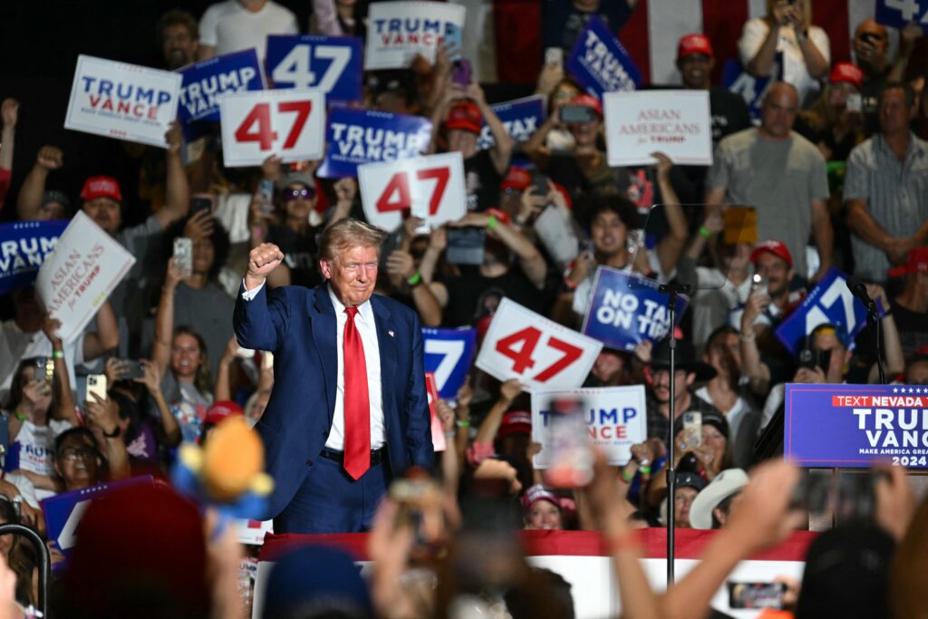 Trump safe after shots reported in his vicinity - secret service. Former US President and Republican presidential candidate Donald Trump raises a fist on stage during a campaign rally at the Expo World Market Center in Las Vegas, Nevada, on September 13, 2024. | Photo by Patrick T. Fallon / AFP