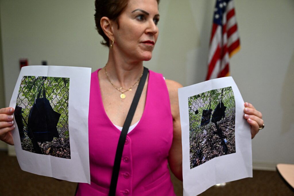 Trump safe after apparent assassination try, person in custody. In photo is press Information Officer Teri Barbera showing pictures of evidence found at the fence of US president Donald Trump's golf course, at a press conference in West Palm Beach, Florida, on September 15, 2024 following a shooting incident at former US president Donald Trump's golf course. | Photo by CHANDAN KHANNA / AFP