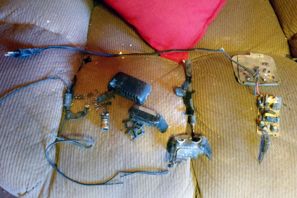 Hezbollah: Device blasts deals group an 'unprecedented blow'. This picture shows on September 18, 2024 the remains of an exploded walkie-talkie device with the Icom logo on a couch inside a house in Baalbek, a Hezbollah stronghold in eastern Lebanon. | AFP