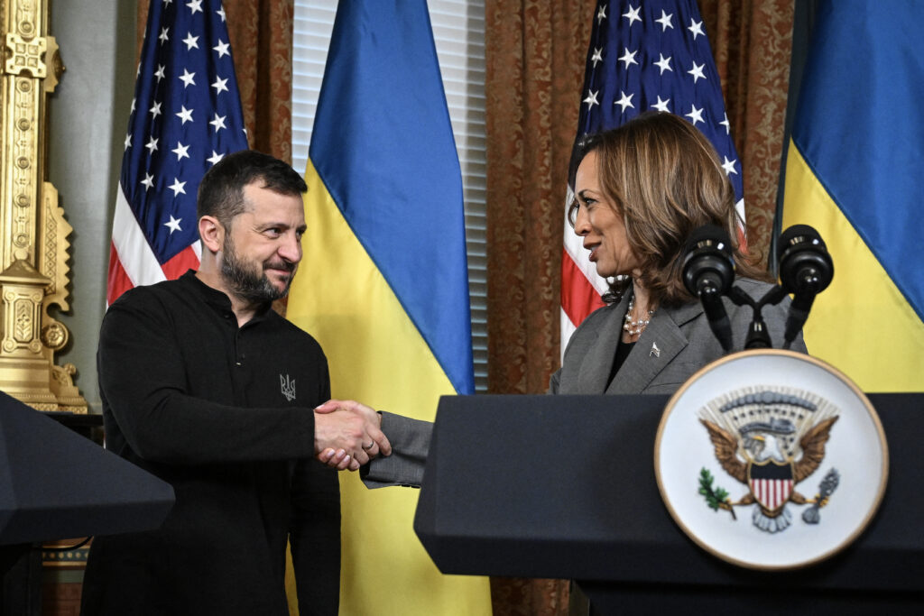 US Vice President and Democratic presidential candidate Kamala Harris (right) and Ukraine's President Volodymyr Zelensky shake hands after speaking to the press before a private meeting, in the Vice President's ceremonial office in the Eisenhower Executive Office Building on the White House campus on September 26, 2024 in Washington, DC. | Photo by Drew ANGERER / AFP