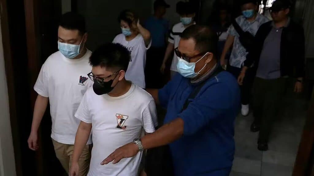 WITH ORDEALS TO TELL Some of the Chinese Pogo workers who filed a complaint for human trafficking against Cassandra Li Ong and 53 other people are seen at the Department of Justice on Tuesday. —Richard A. Reyes