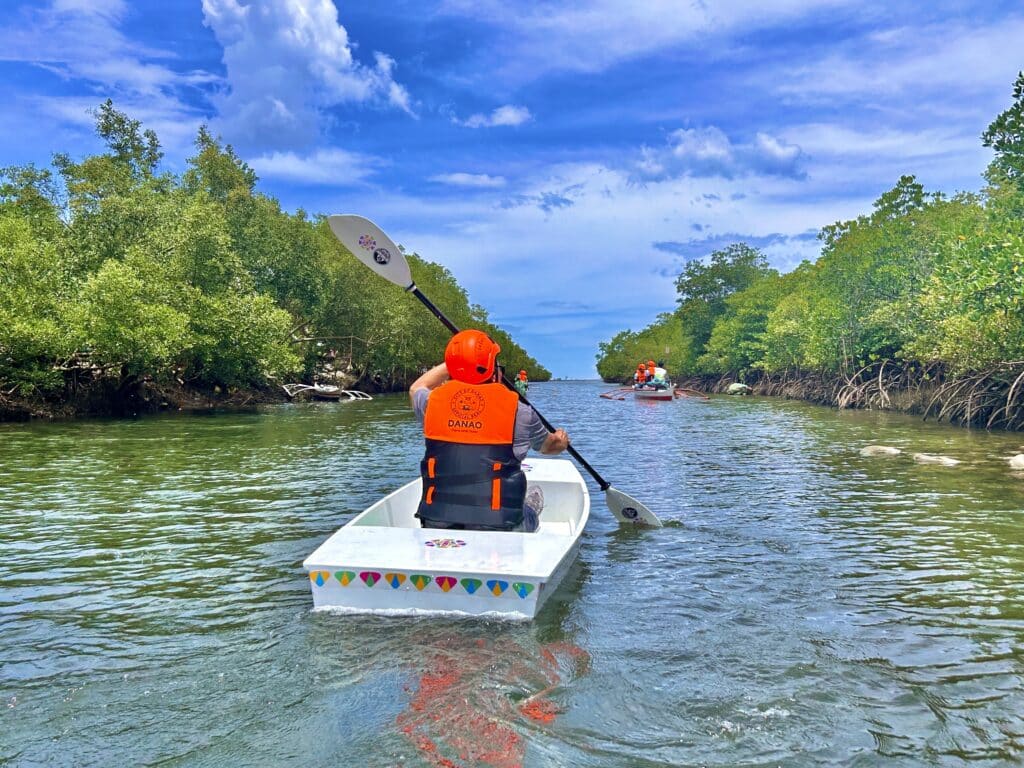 Tawsan Mangroves in N. Cebu: Explore this new travel destination. Photo is another one where a tourist enjoys kayaking in Tawsan.