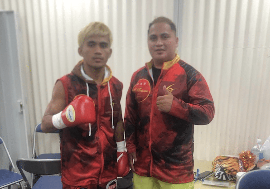 Jimenez absorbs first defeat, but impresses in gritty Japan bout. In photo are John Kevien Jimenez (left) and his brother and trainer Junrel Jimenez (right) before his fight in Japan. | Photo from Junrel Jimenez