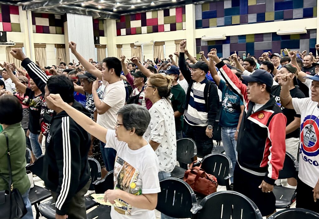 Opascor workers, shareholders urge CEO Riveral to step down. In photo are over a hundred workers and shareholders of the Oriental Port and Allied Services Corporation (OPASCOR) calling for Lawyer Tomas Riveral to quit.