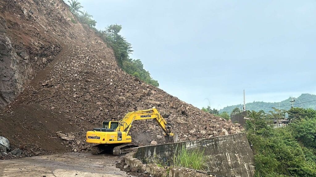 Soil and debris have blocked the Manipis Road in Camp 4, Talisay City, which connects Cebu and Talisay Cities with Toledo City, early on Wednesday morning, October 2. | Paul Lauro