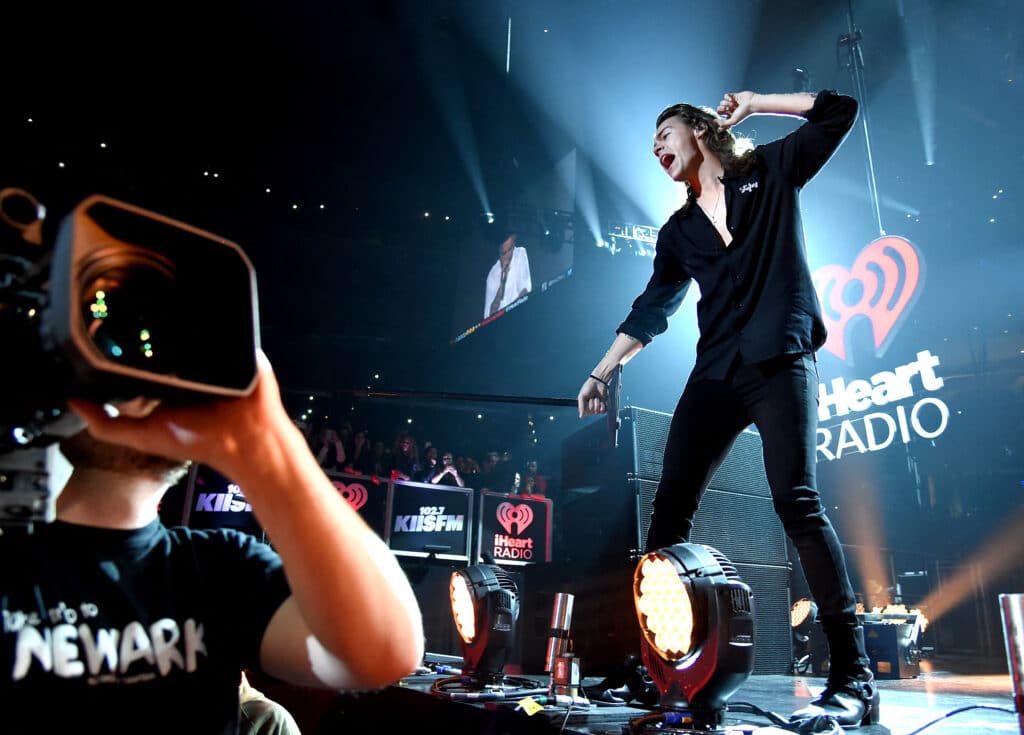 Singer Harry Styles of One Direction performs onstage during 102.7 KIIS FM?s Jingle Ball 2015 Presented by Capital One at STAPLES CENTER on December 4, 2015 in Los Angeles, California. |  Jason Merritt/Getty Images for iHeartMedia/AFP