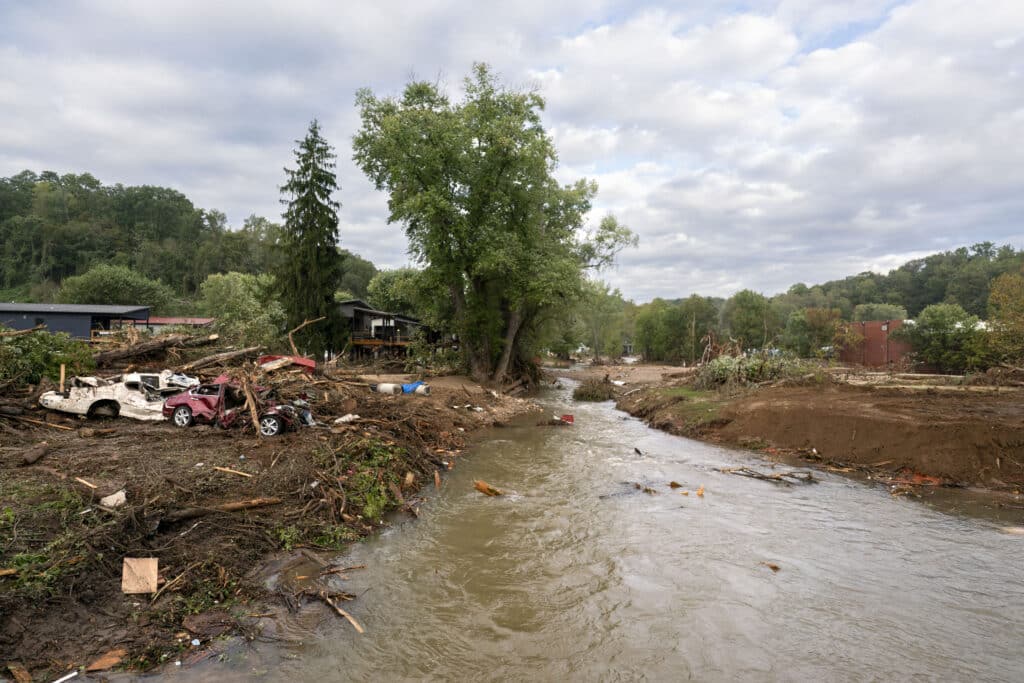 Flood damage is seen along Mill Creek in the aftermath of Hurricane Helene on September 30, 2024 in Old Fort, North Carolina. | Sean Rayford/ Getty Images via AFP