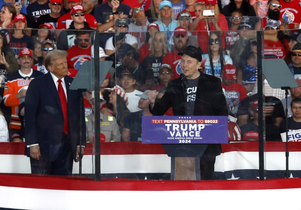 Musk finally unveiling his long-promised robotaxi. Tesla CEO Elon Musk (right) endorses Republican presidential nominee, former President Donald Trump, during a campaign rally at the Butler Farm Show fairgrounds on October 05, 2024 in Butler, Pennsylvania. | Photo by Kevin Dietsch / Getty Images via AFP