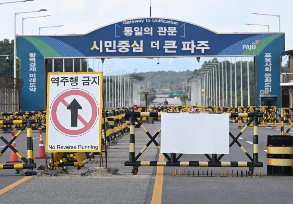 Barricades set up at a military checkpoint on the Tongil bridge, the road leading to North Korea's Kaesong city, in the border city of Paju on October 9, 2024. | Photo by Jung Yeon-je / AFP