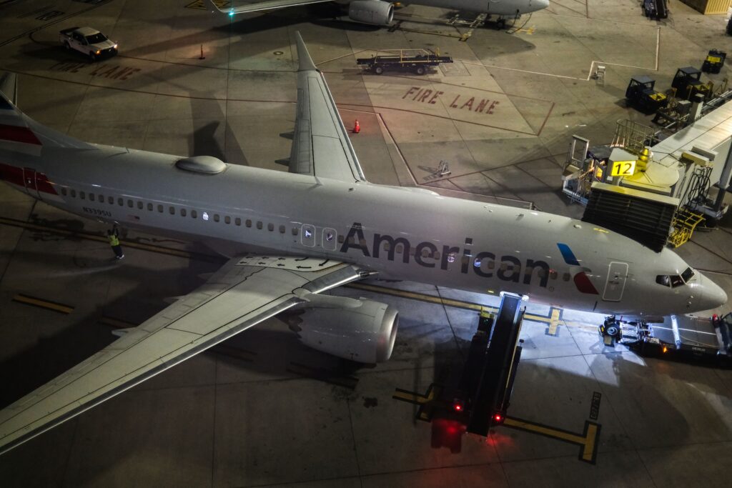 A Boeing 737 MAX 8 American Airlines passenger aircraft is seen at a terminal at LaGuardia airport in New York City on October 14, 2024. (Photo by CHARLY TRIBALLEAU / AFP)