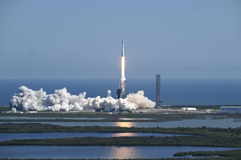 A SpaceX Falcon Heavy rocket with the Europa Clipper spacecraft aboard launches from Launch Complex 39A at NASA's Kennedy Space Center in Cape Canaveral on October 14, 2024. | Photo by CHANDAN KHANNA / AFP