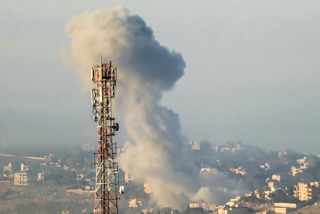 Israel strikes Lebanon after PM's vows of no mercy for Hezbollah. In photo smoke billows from the site of an Israeli air strike on the village of Taybeh in southern Lebanon on October 15, 2024. | Photo by AFP