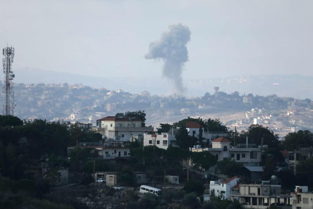 Smoke billows from the site of an Israeli air strike on the village of Taybeh in southern Lebanon on October 17, 2024, amid the continuing war between Hezbollah and Israel. (Photo by AFP)