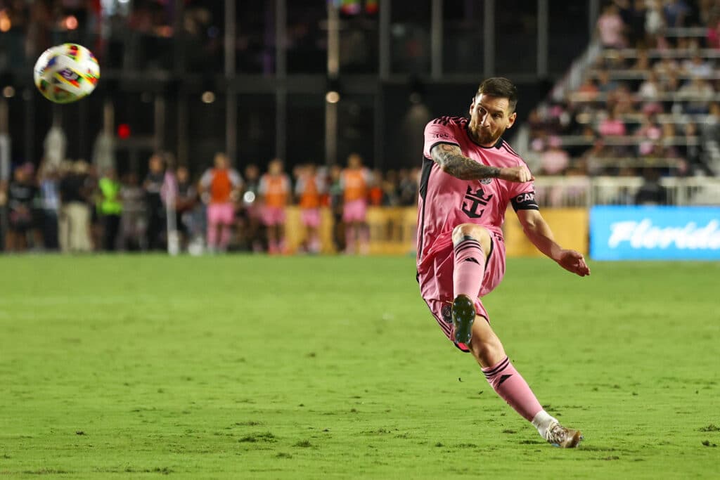 Inter Miami's Argentine forward #10 Lionel Messi kicks the ball during the Major League Soccer (MLS) football match between Inter Miami and New England Revolution at Chase Stadium in Fort Lauderdale, Florida, October 19, 2024. | Photo by Chris Arjoon / AFP