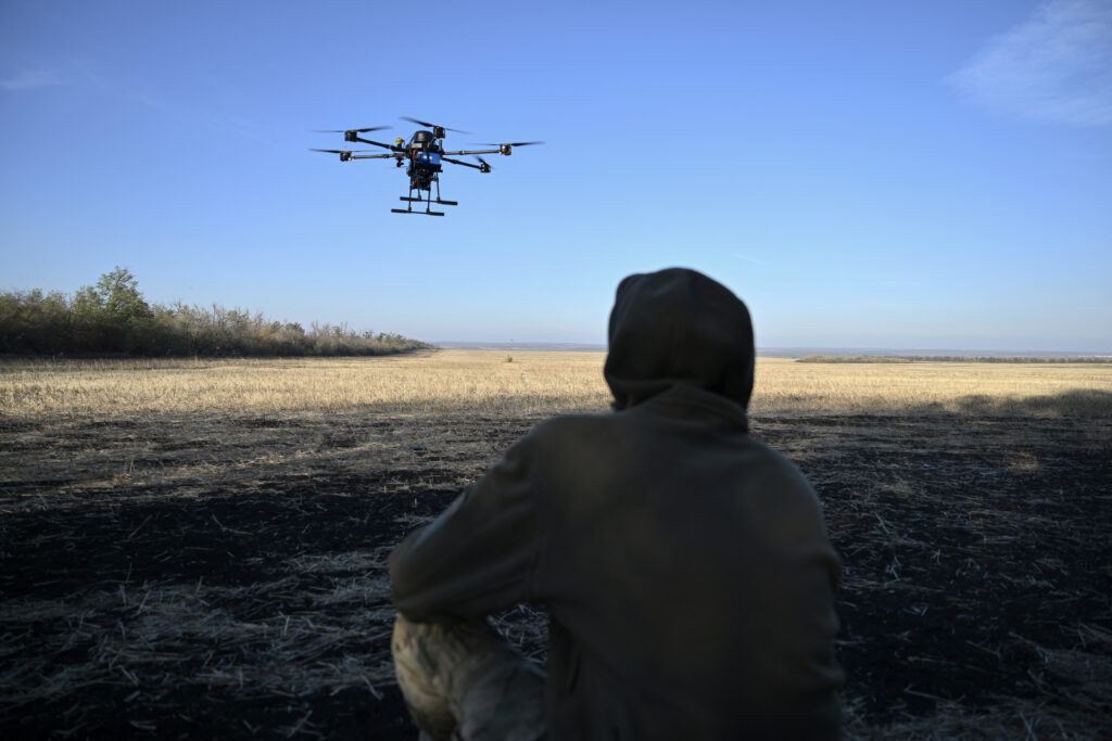 Ukraine: North Korean troops arrived in Russian 'combat zone'. A Ukrainian serviceman of the 30th separate mechanized brigade runs tests flights of a hexacopter drone ahead of battle mission in the eastern Donetsk region on October 22, 2024, amid the Russian invasion of Ukraine. | Photo by Genya SAVILOV / AFP