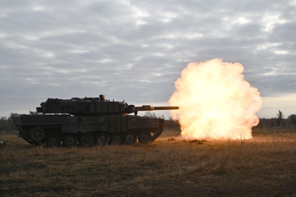 North Korea sent 10,000 troops to train in Russia, US says. Tankers from the 33rd separate mechanized brigade of the Ukrainian Ground Forces fire with a Leopard 2A4 tank during a field training at an undisclosed location in Ukraine on October 27, 2024, amid the Russian invasion on Ukraine. (Photo by Genya SAVILOV / AFP)