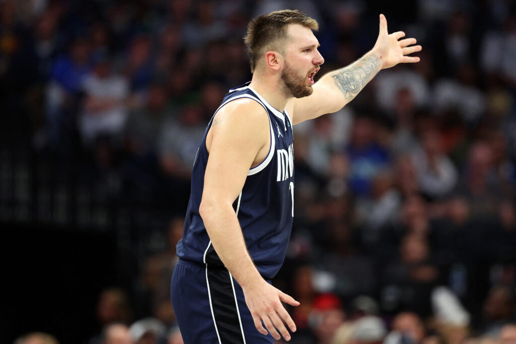 NBA: Mavericks down Timberwolves as Irving outduels Edwards. In photo is Luka Doncic #77 of the Dallas Mavericks reacting against the Minnesota Timberwolves in the third quarter at Target Center on October 29, 2024 in Minneapolis, Minnesota. The Mavericks defeated the Timberwolves 120-114. | David Berding/Getty Images/AFP