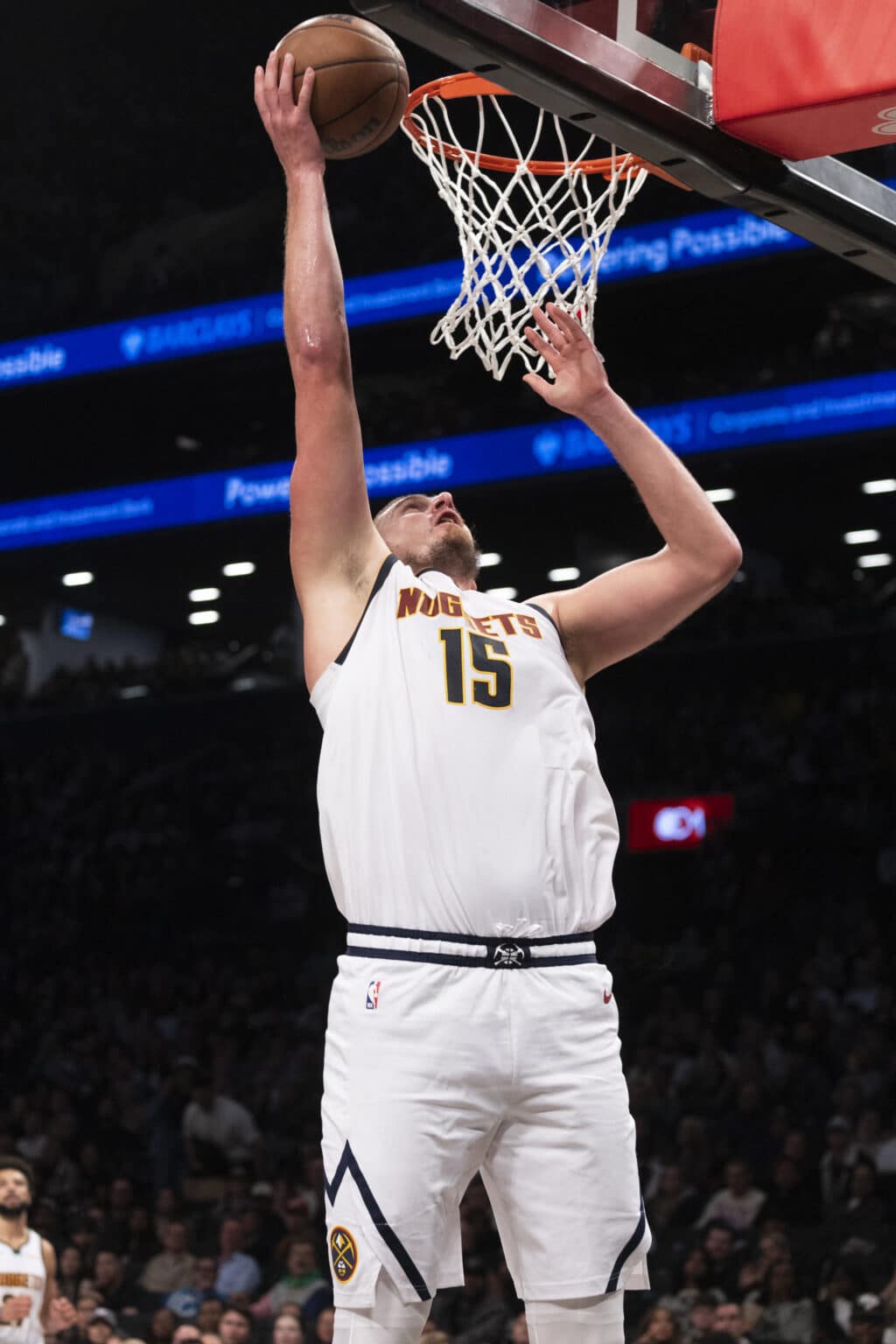 NBA: Mavericks down Timberwolves as Irving outduels Edwards. In photo is Nikola Jokic #15 of the Denver Nuggets makes a layup against the Brooklyn Nets during the second half at Barclays Center on October 29, 2024 in New York City.| Michelle Farsi/Getty Images/AFP