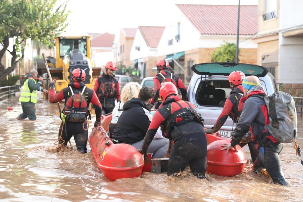 Spain: Rescuers race to save victims as floods kill 95. This handout photo taken by the UME - Spanish Military Emergencies Unit shows Spanish rescuers taking residents on a dinghy boat following deadly flooding, in Valencia, on October 30, 2024. | Photo by Handout / UME / AFP