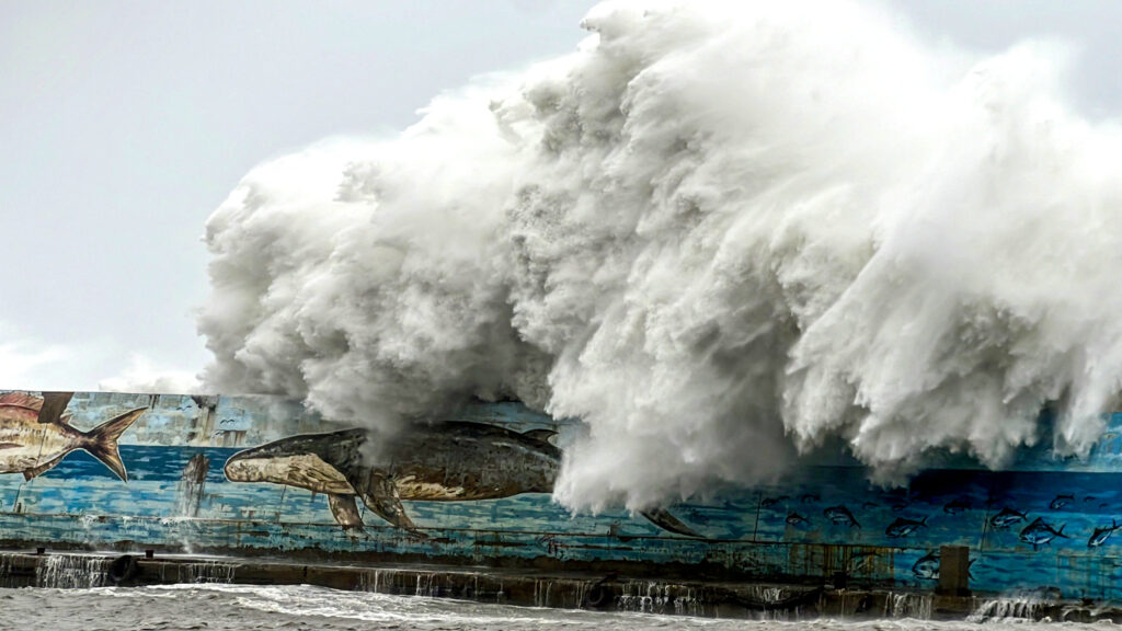 Super Typhoon Kong-Rey nears Taiwan, offices, schools closed. This picture taken and released by Taiwans Central News Agency (CNA) on October 31, 2024 shows a wave crashing over a sea wall as Super Typhoon Kong-rey neared the coast in Taitung.| Photo by CNA / AFP