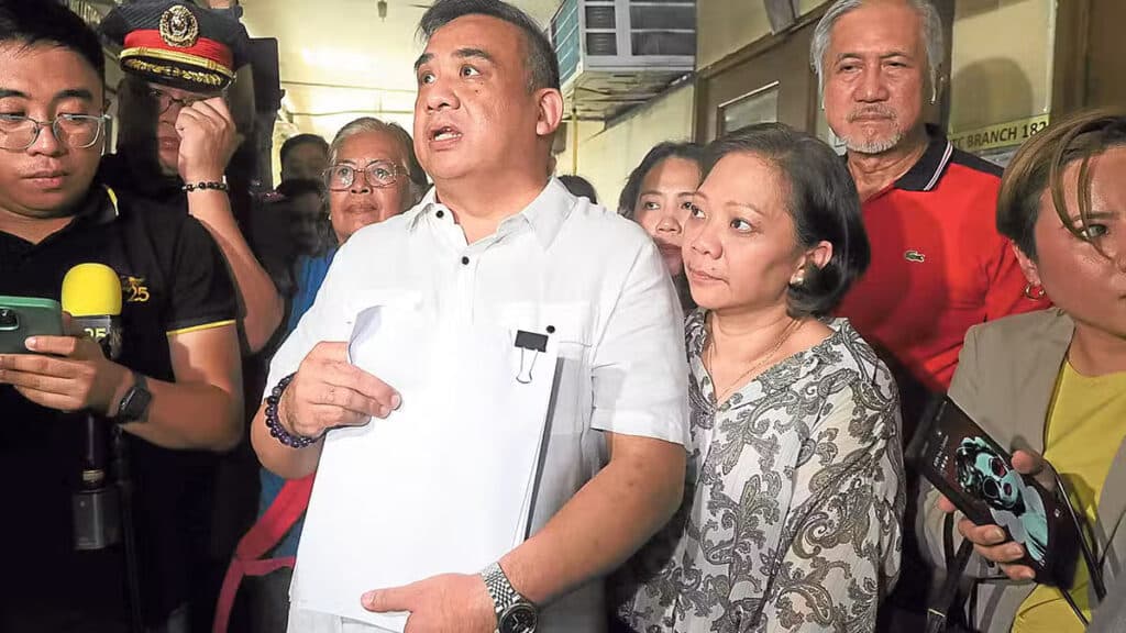 SEVEN-YEAR QUEST FOR JUSTICE Carmina and Horacio Castillo II, the parents of the hazing victim, show a copy of the Manila court decision shortly after Tuesday’s promulgation.