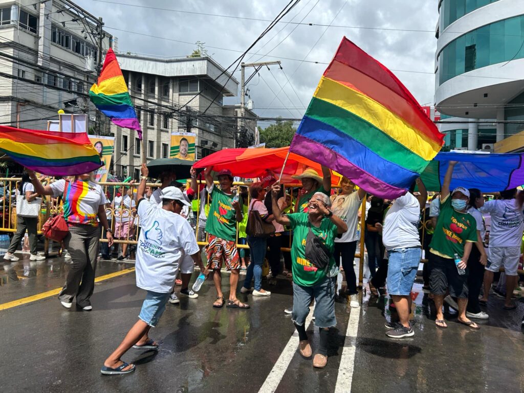 Several supporters, including members of the LGBTQ+