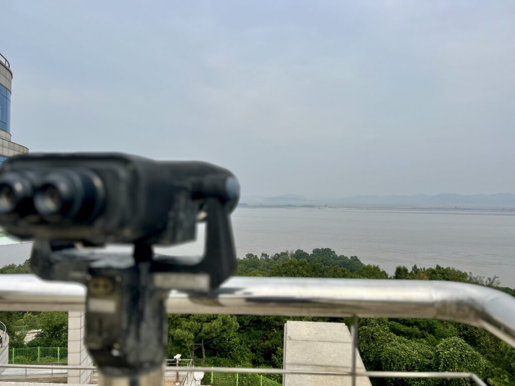 A pair of powerful binoculars in Ganghwa Peace Observatory, a mixed civilian and military facility located at Ganghwa Island in South Korea. The site stands approximately 3 kilometers away from the coasts of North Korea. With the binoculars, visitors can see villages and people in North Korea from afar. | Photo by Morexette Marie Erram