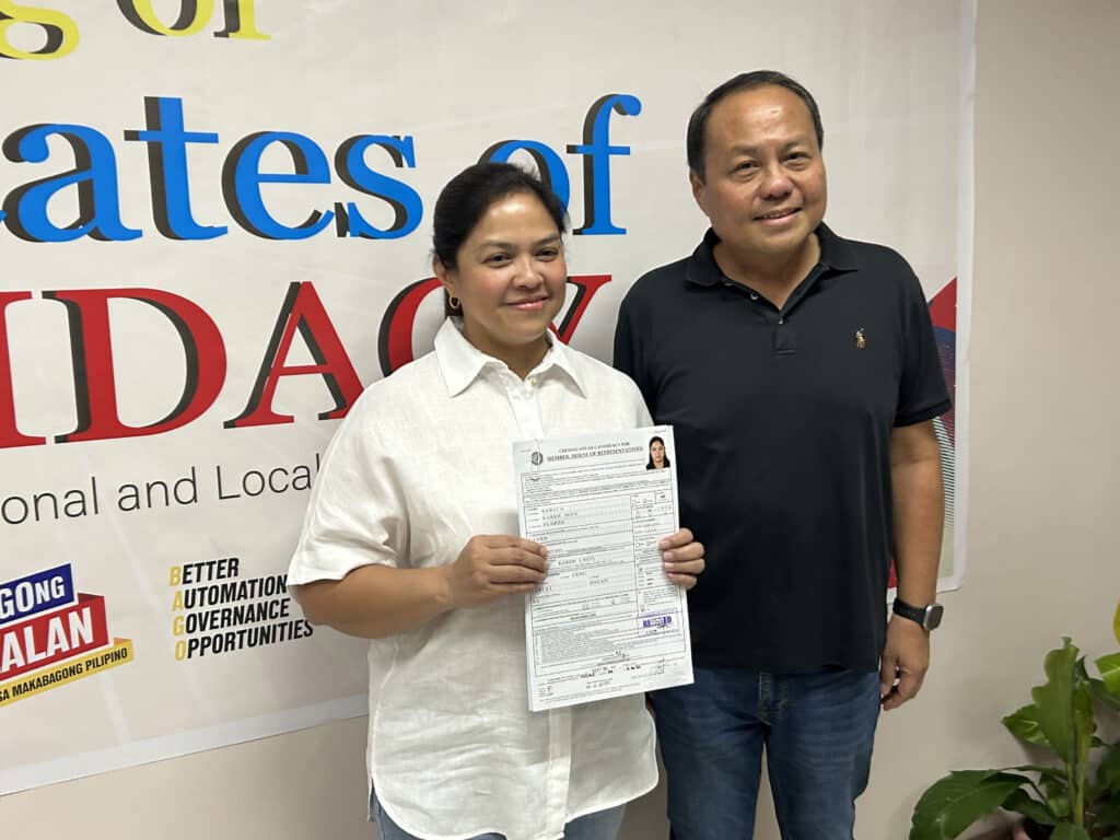 Cebu province, COC filing: The surprises and twists. In photo is Karen Flores-Garcia (left) filing her COC for Congresswoman of Cebu's 3rd District after her husband, incumbent Rep. Pablo John Garcia, withdrew his bid to be reelected in the position on Tuesday, October 8, 2024. | Photo by Morexette Marie Erram