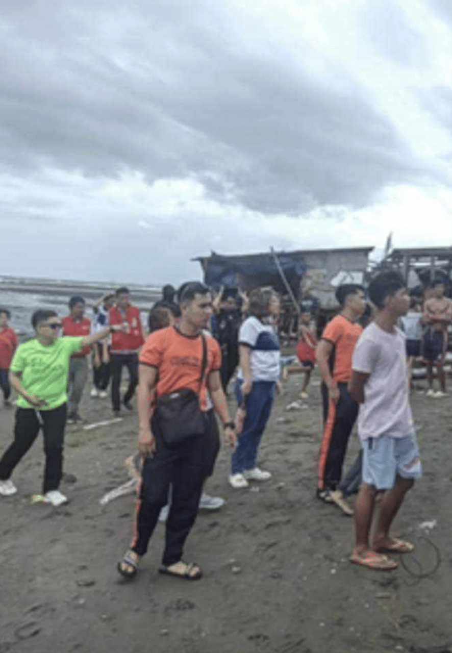 These are some of the residents of Sitio Litmon, Barangay Dumlog in Talisay City, Cebu after big waves and strong wind brought about by severe tropical storm Kristine destroyed houses in the area. | Contributed photo via Futch Anthony Inso