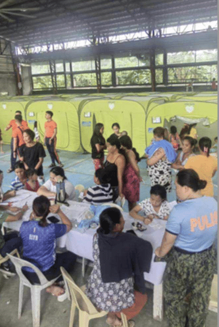 These are some of the residents of Sitio Litmon, Barangay Dumlog in Talisay City, Cebu after big waves and strong wind brought about by severe tropical storm Kristine destroyed houses in the area. | Contributed photo via Futch Anthony Inso