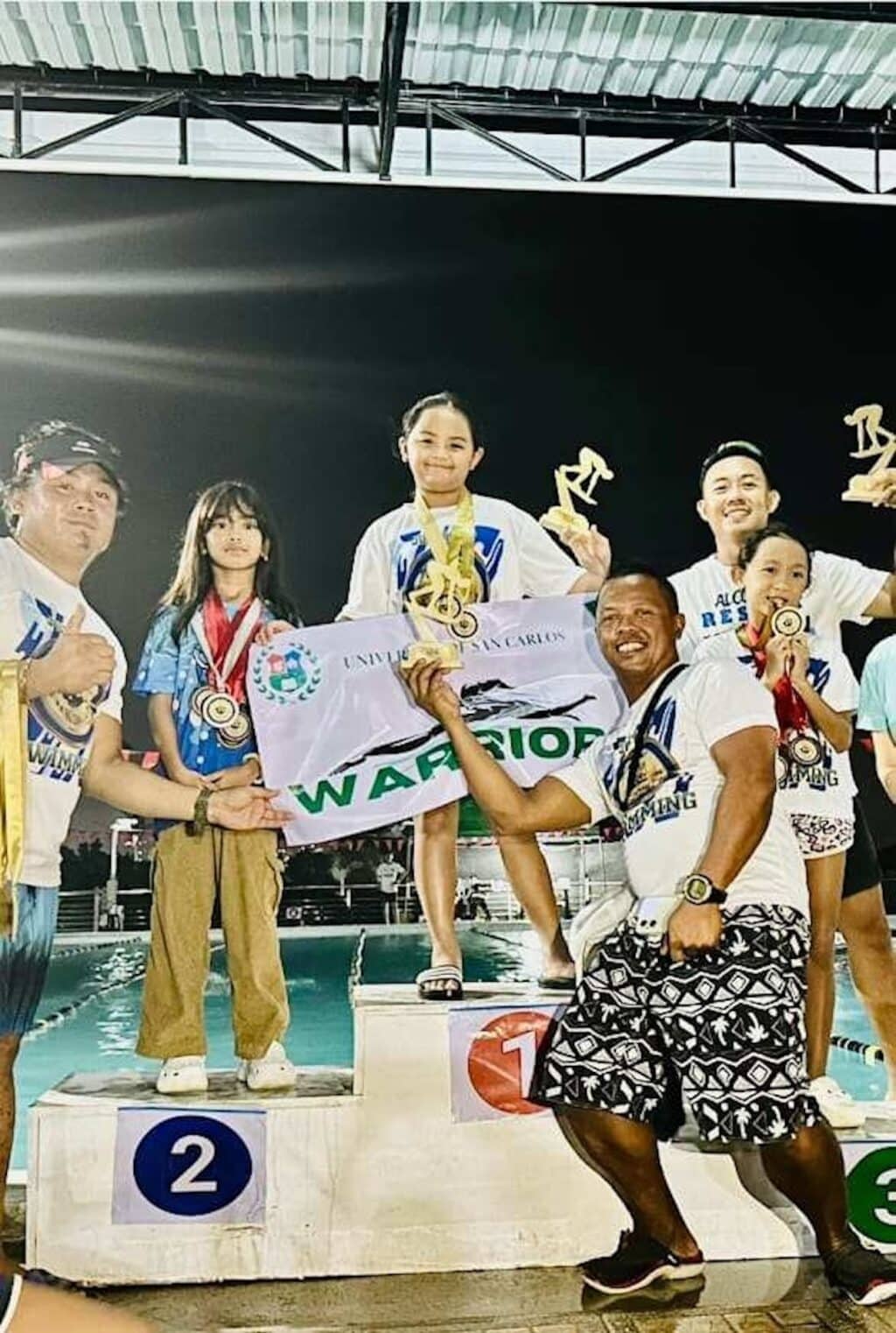 Adrianna Erika Ching, 8 years old, is the overall champion in Bo's Talisay Swimming Challenge held on October 12. | Contributed photo