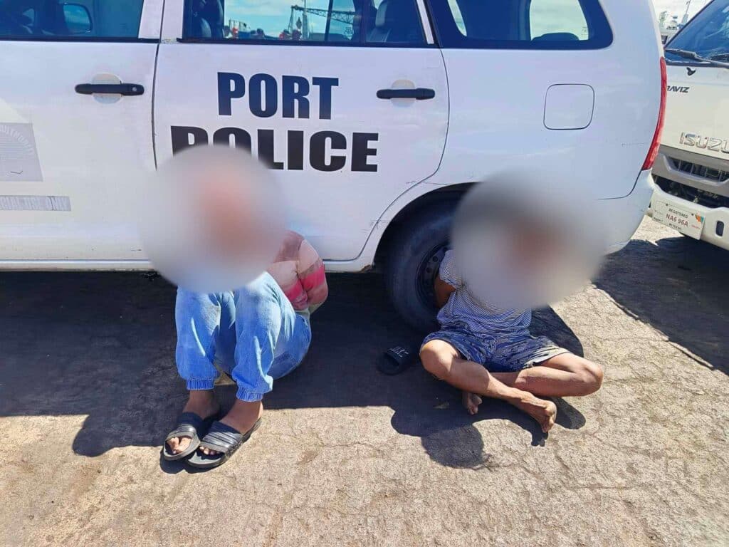 Two men were caught with illegal rugs and a gun during a saturation drive in Pier 2 of Cebu City. | Contributed photo via Futch Anthony Inso