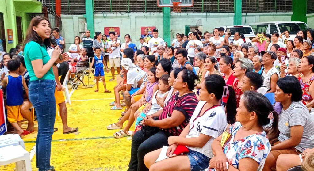 Milka Romero eyes elevating National Academy of Sports, 1-Pacman Party List's first nominee Milka Romero speaking in front of Barangay Lorega San Miguel's senior citizens during a medical mission. | Glendale Rosal