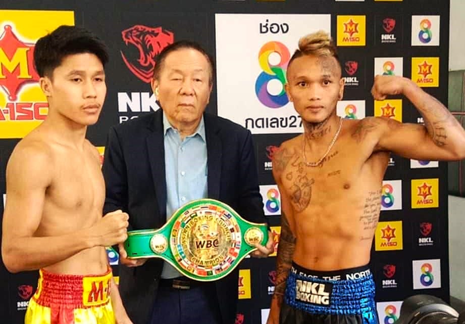 Michael Adolfo (right) and Danai Ngiabphukhiaw (left) pose for a photo with the WBC regional title belt displayed during their weigh-in on Friday. | Contributed photo