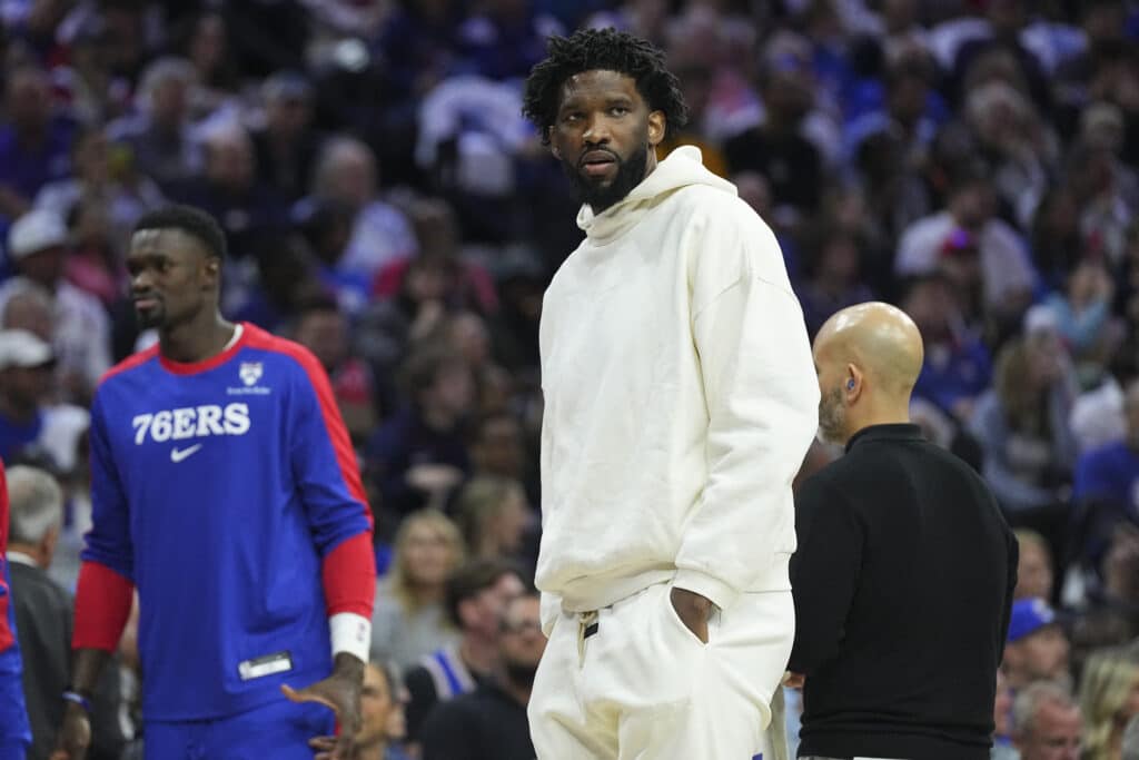 Joel Embiid #21 of the Philadelphia 76ers looks on during a timeout against the Milwaukee Bucks in the first half at the Wells Fargo Center on October 23, 2024 in Philadelphia, Pennsylvania.| Photo by Mitchell Leff / Getty Images via AFP