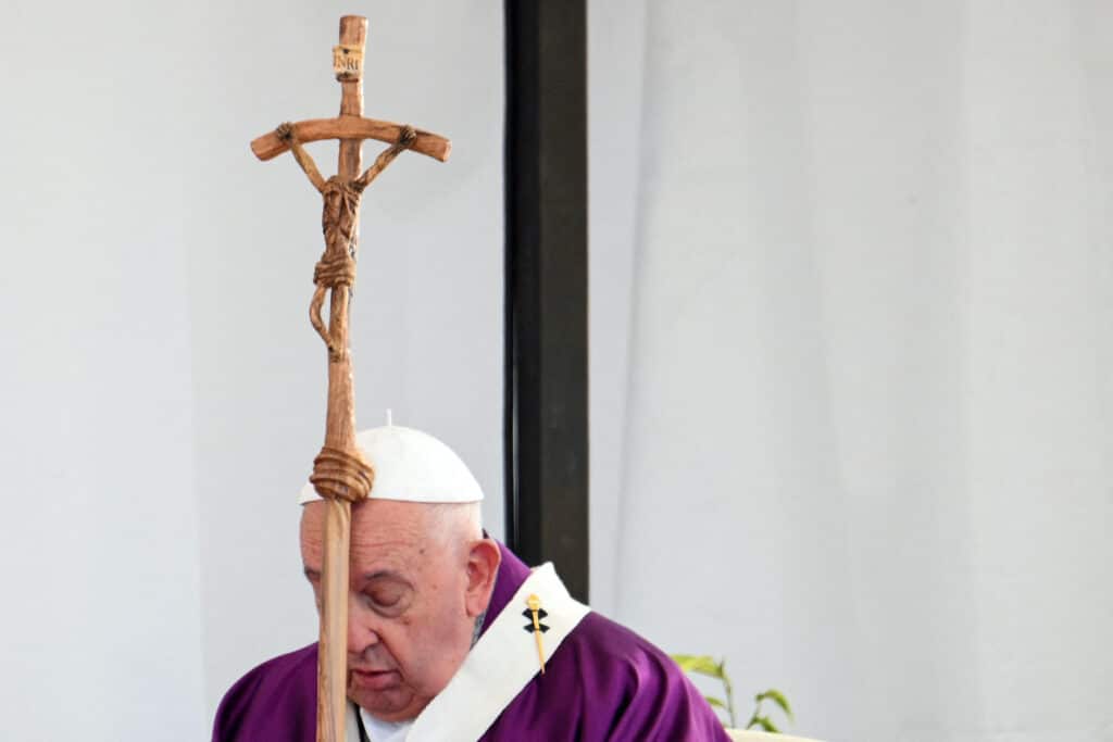 Pope Francis prays in front of graves of unborn children. Pope Francis leads the All Souls' Day Papal Mass as part of the commemoration of all the faithful departed at the Laurentino cemetery in the south of Rome on November 2, 2024. | Photo by Alberto PIZZOLI / AFP