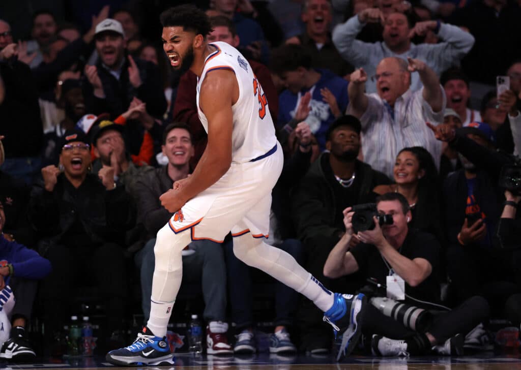 Karl-Anthony Towns #32 of the New York Knicks celebrates after his dunk against the Chicago Bulls during the third quarter at Madison Square Garden on November 13, 2024 in New York City.| Elsa/Getty Images/AFP