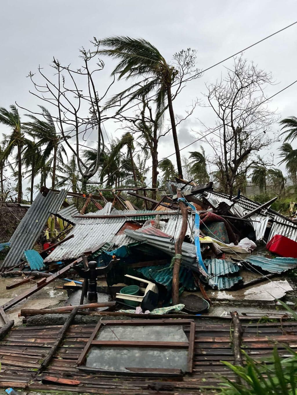 This handout taken and released on November 17, 2024 courtesy of Mayor Cesar Robles shows a destroyed house in Panganiban town, Catanduanes province, after Super Typhoon Pepito hit the province. | Photo courtesy of Mayor Cesar Robles / AFP