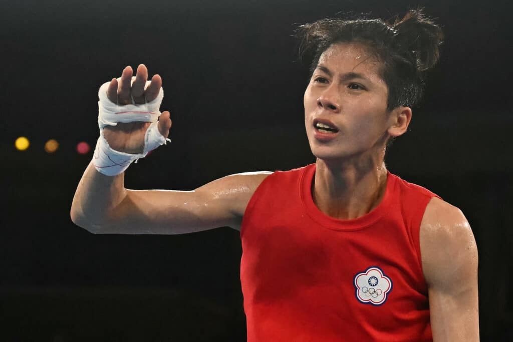 Taiwan boxer at center of Olympic gender row 'quits event. (FILES) Taiwan's Lin Yu-ting reacts after beating Poland's Julia Szeremeta (Blue) in the women's 57kg final boxing match during the Paris 2024 Olympic Games at the Roland-Garros Stadium, in Paris on August 10, 2024. | Photo by Mauro PIMENTEL / AFP