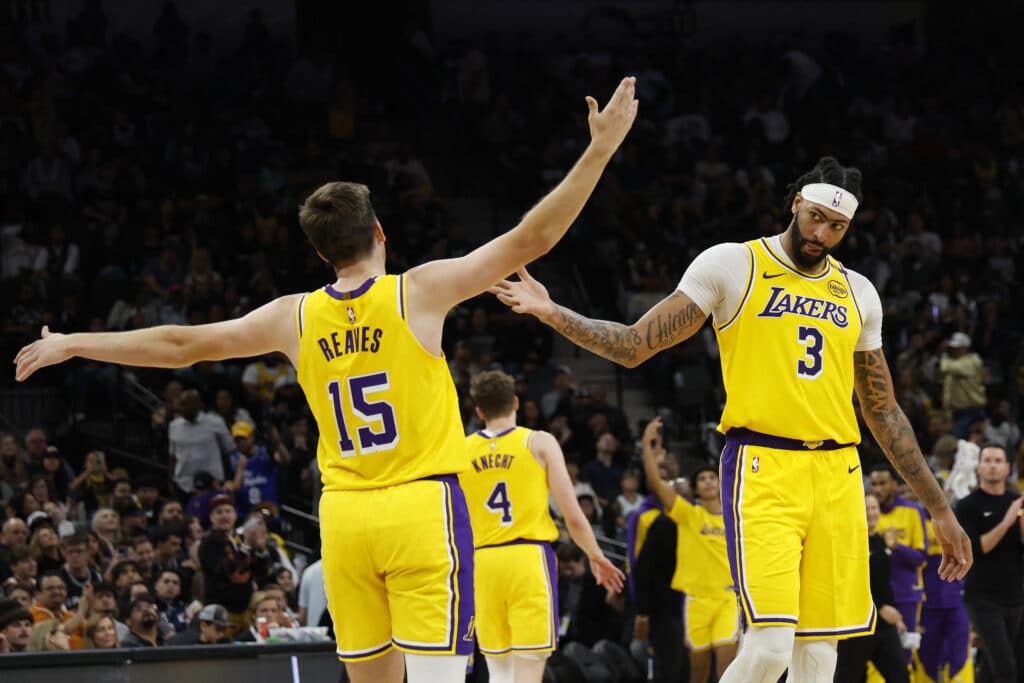 NBA: Lakers stop 3-game skid, beat Wembanyama-led Spurs. Austin Reaves #15 of the Los Angeles Lakers reacts with Anthony Davis #3 during the fourth quarter against the San Antonio Spurs at Frost Bank Center on November 27, 2024 in San Antonio, Texas.| Photo by Ronald Cortes/Getty Images/AFP