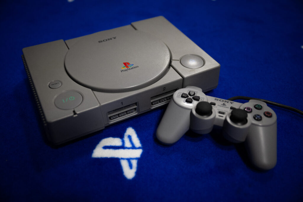 PlayStation: Fun facts to know as Sony's console turns 30. (FILES) This photograph shows a PlayStation 1 console and controller, in Vraiville, northern France, on November 20, 2024. | Photo by LOU BENOIST / AFP