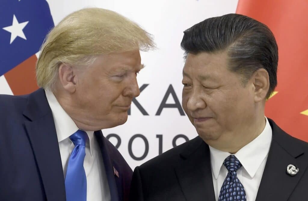 FILE - In this Saturday, June 29, 2019, file photo, U.S. President Donald Trump, left, meets with Chinese President Xi Jinping during a meeting on the sidelines of the G-20 summit in Osaka, Japan Four decades after the U.S.established diplomatic ties with communist China, the relationship between the two is at a turning point. (AP Photo/Susan Walsh, File)